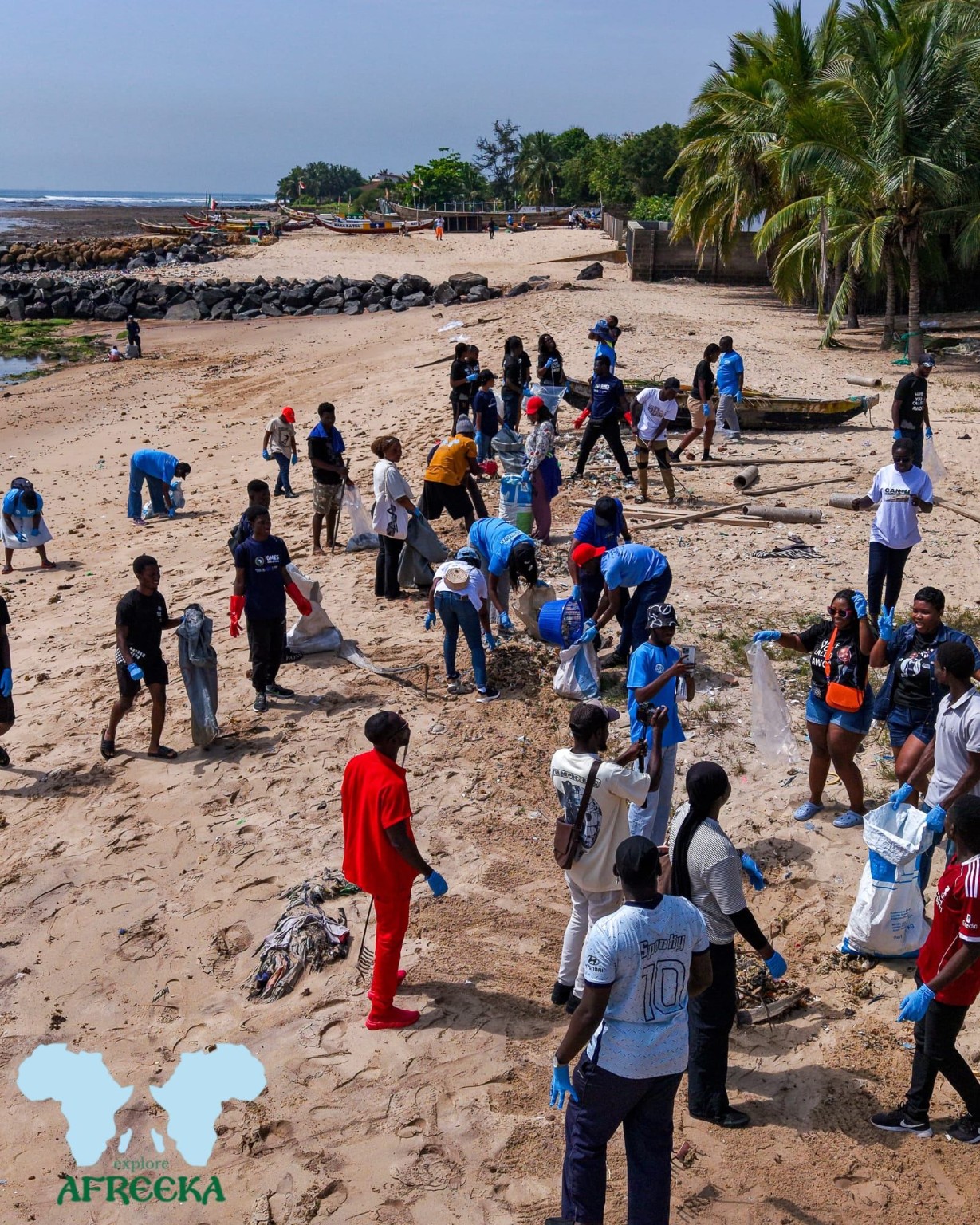 Volunteers collecting waste during a beach clean-up